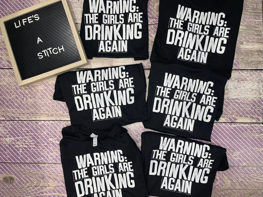 Warning the girls are drinking again hoodie